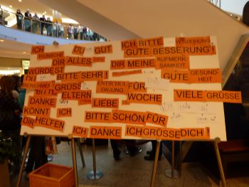 Plakat mit Wortgebilden